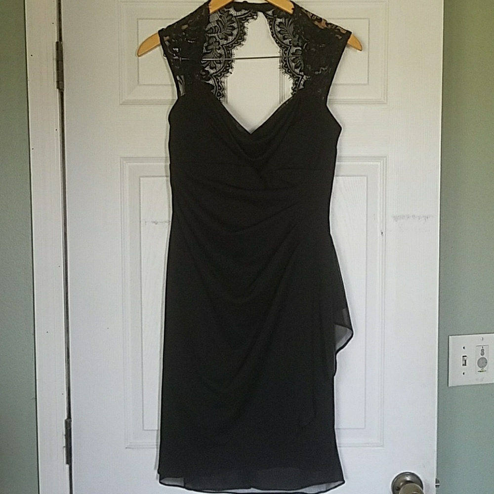 Black formal dress with lace accents.
